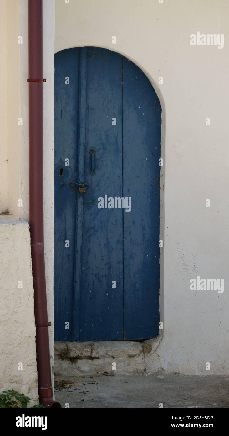 Vertical closeup shot of an old wooden door with a lock Stock Photo - Alamy