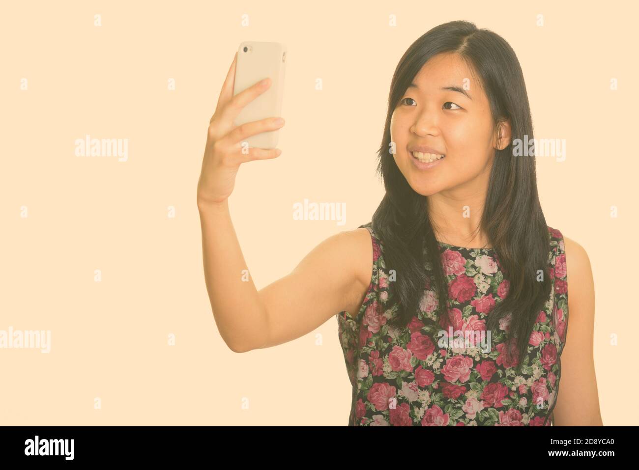 Young happy Asian woman taking selfie with mobile phone Stock Photo - Alamy