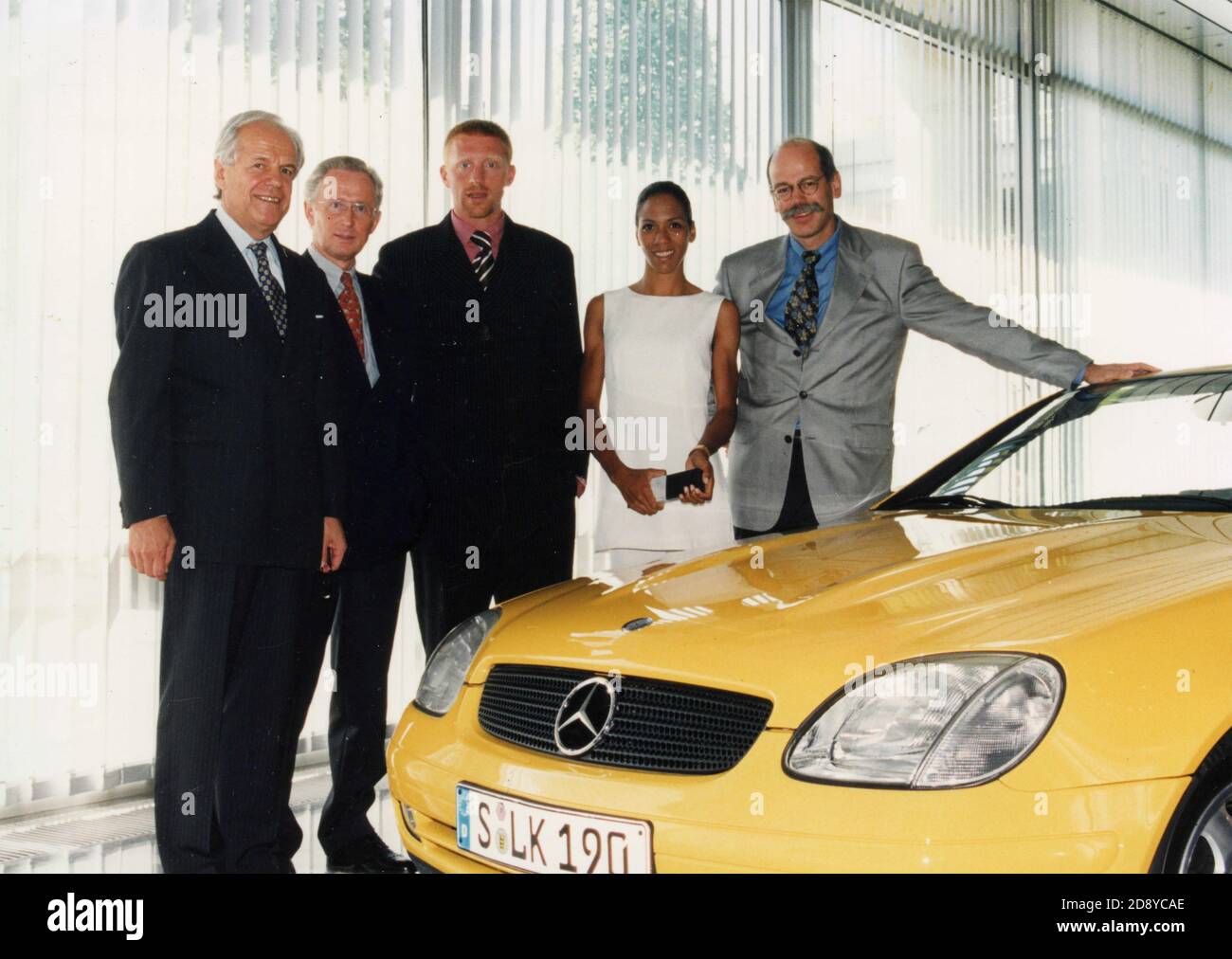 German tennis player Boris Becker with Helmut Werner at Mercedes car dealer, Stuttgart, Germany 1996 Stock Photo