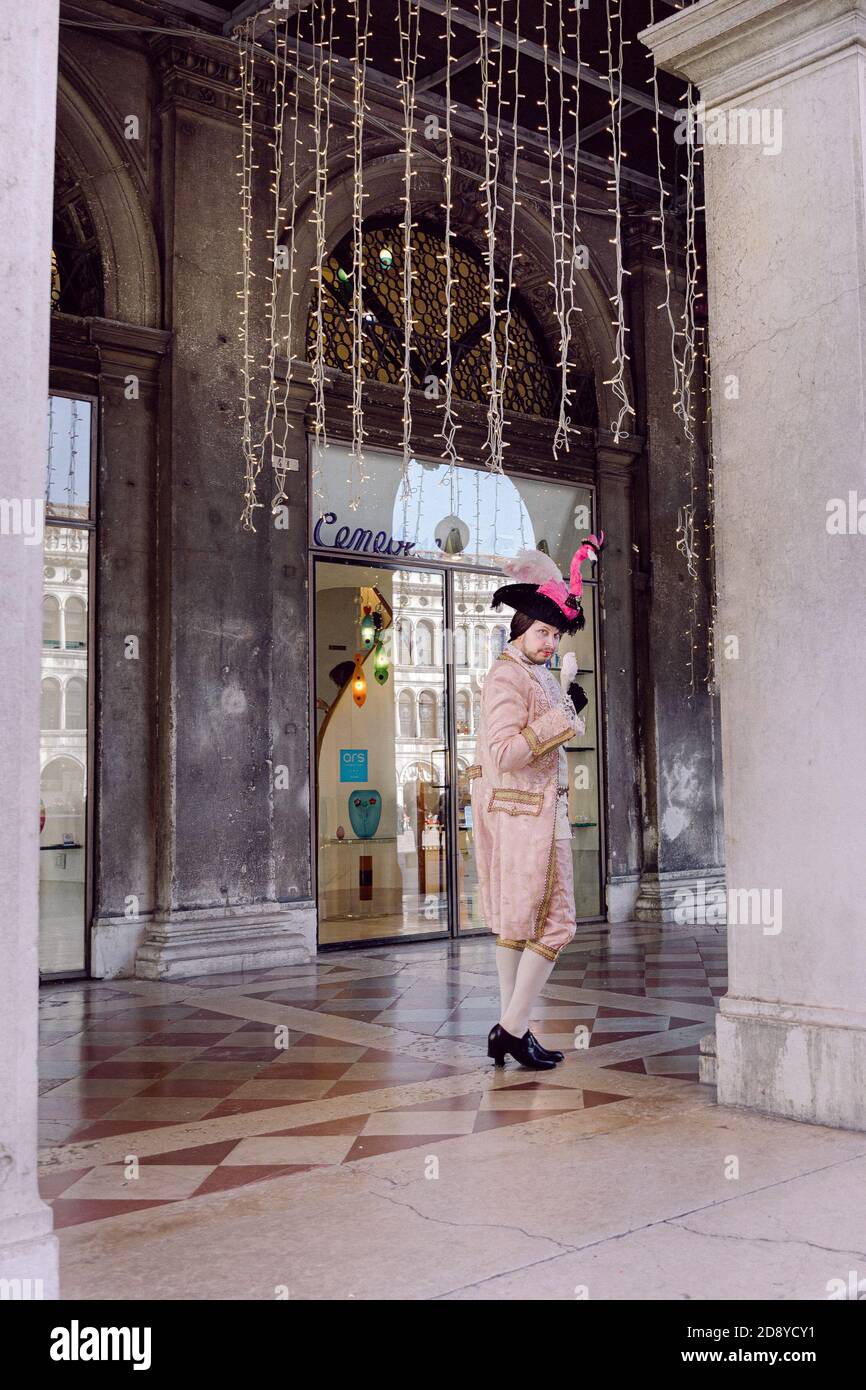 Pink venetian carnival costume hi-res stock photography and images - Alamy