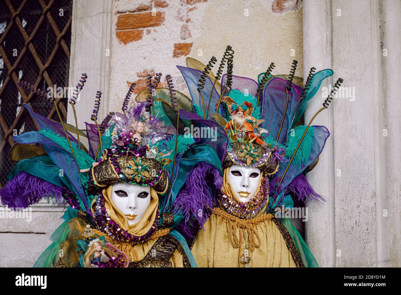 Two people with costumes and masks Stock Photo - Alamy