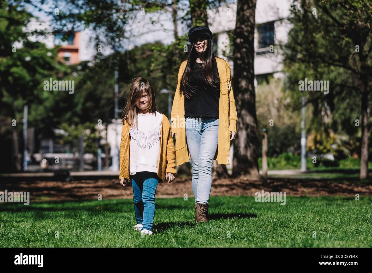 Mother with her baby. Mom and daughter in an autumn park Stock Photo ...