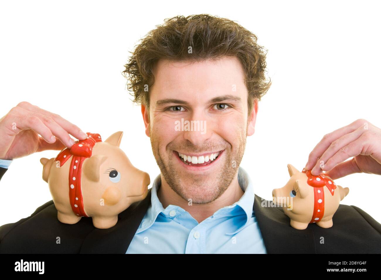 Young man in suit carries two piggy banks on his shoulders Stock Photo ...