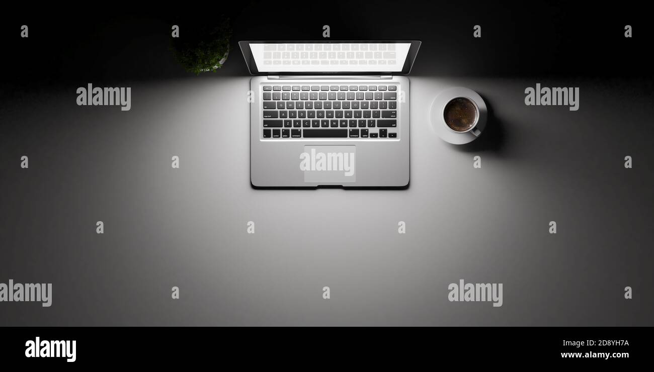 Top view of laptop concept with white desk under spot light and coffee