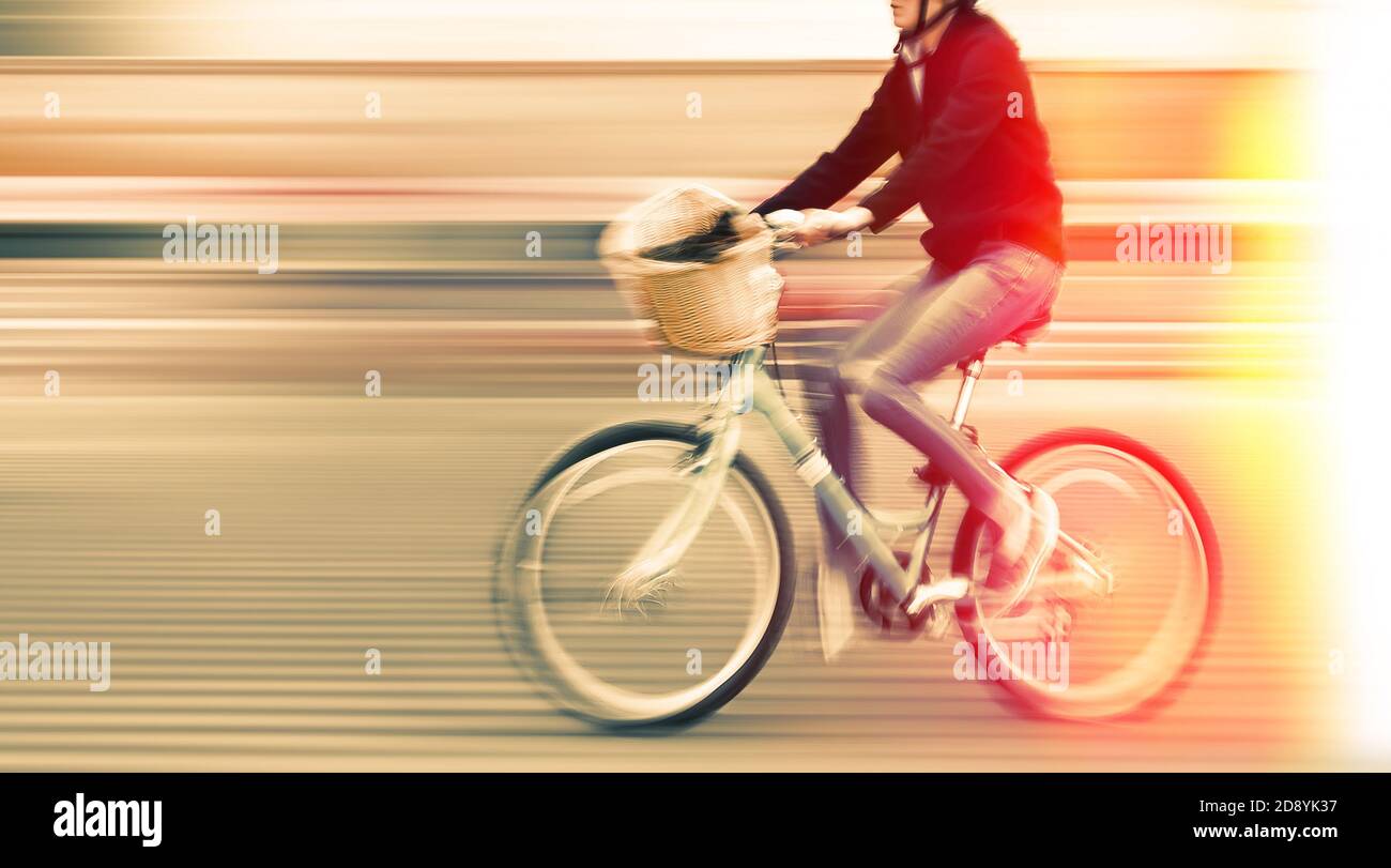 Abstract image of cyclist on the city roadway. Intentional motion blur ...