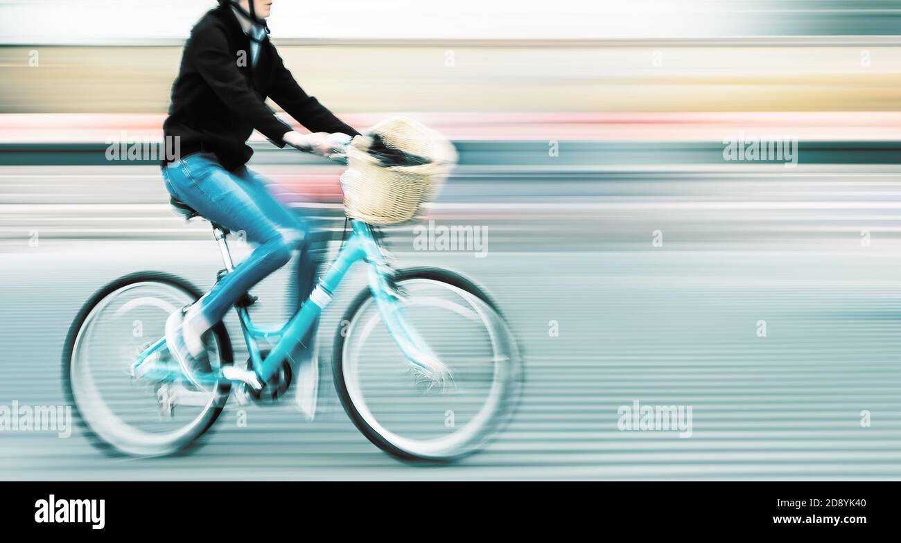 Abstract image of cyclist on the city roadway. Intentional motion blur ...