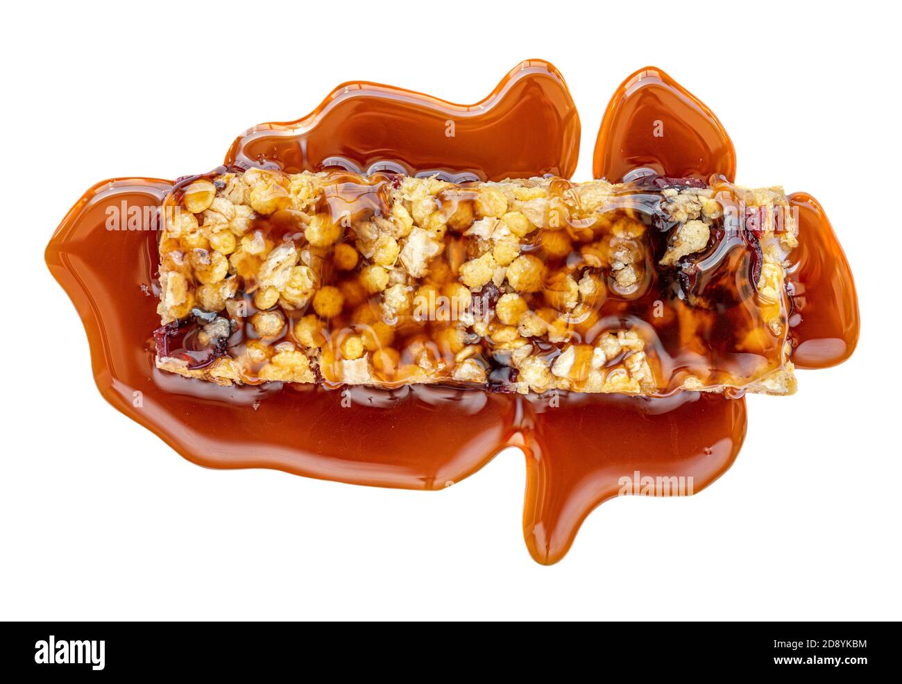 Granola bar with roasted nuts and caramel sauce isolated on white