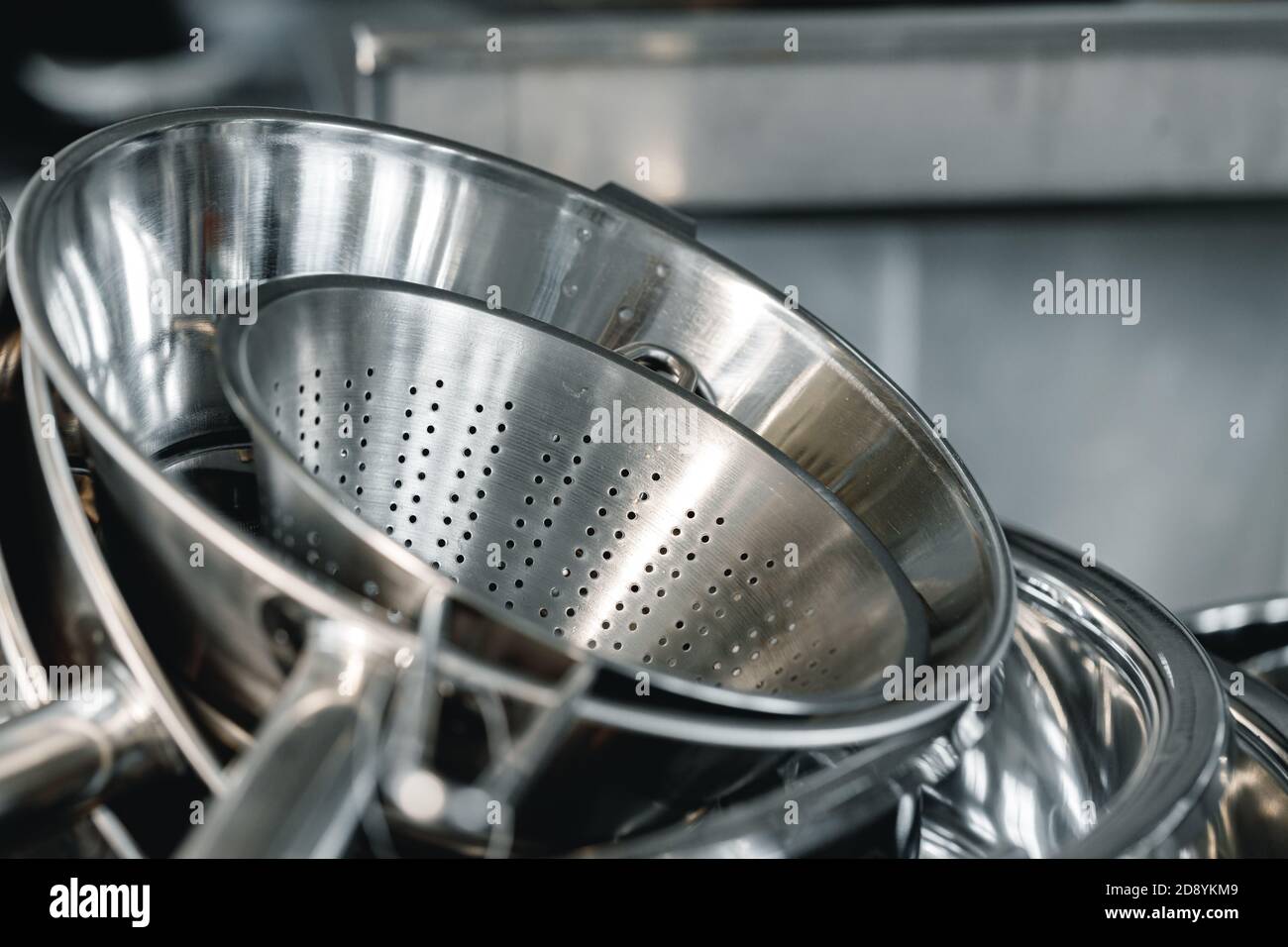 Industrial aluminum colanders on professional kitchen close up Stock ...