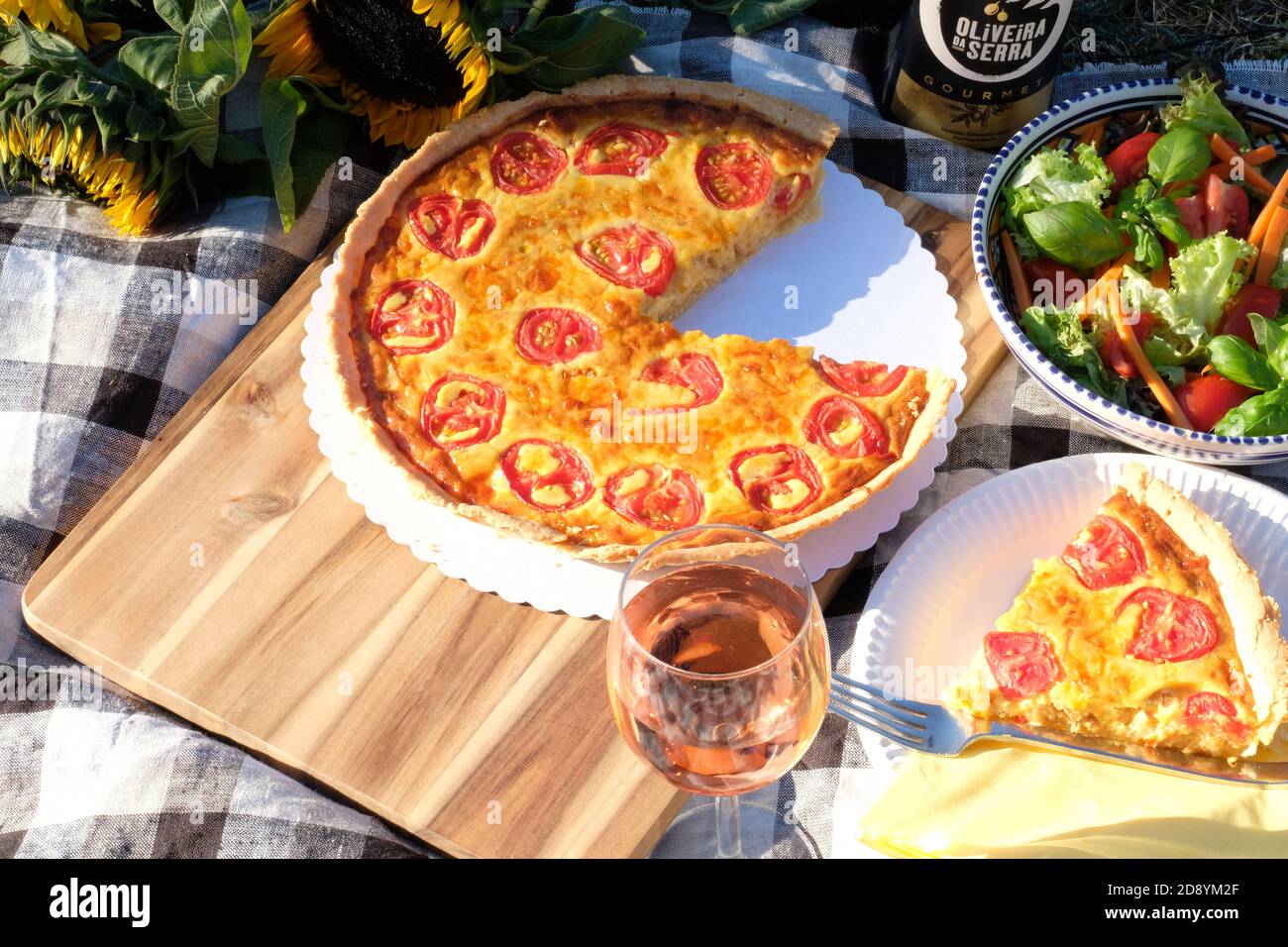 Cheese, onion and tomato quiche Stock Photo Alamy