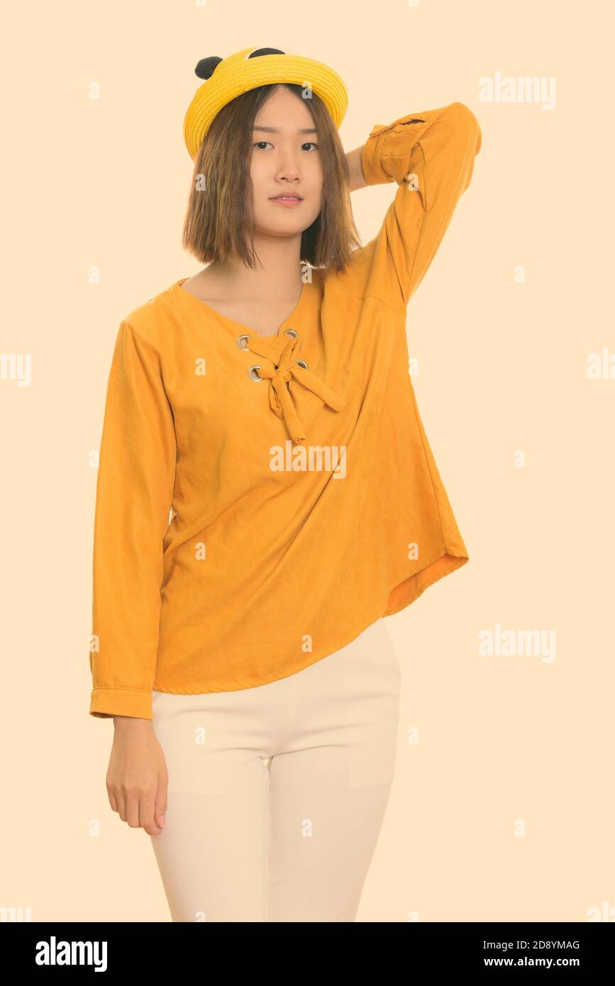 Cute asian female posing hi-res stock photography and images - Alamy