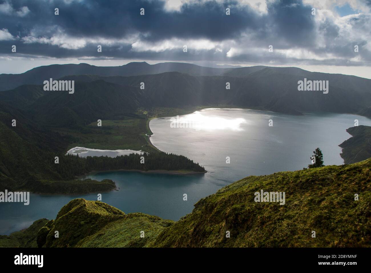 Astounding landscape view of fogo lagoon in azores, under dramatic cloudy sky Stock Photo
