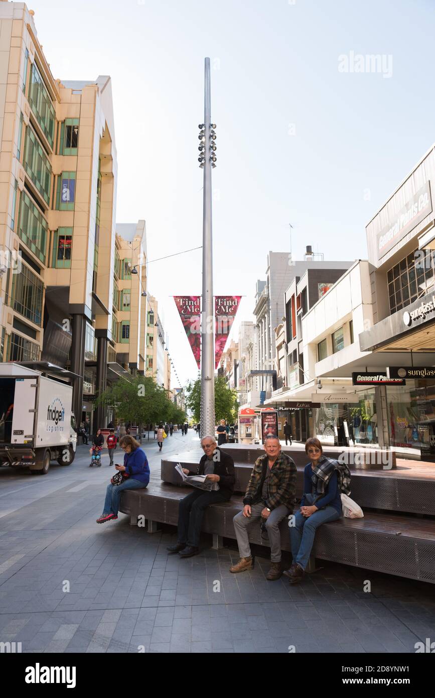 Shoppers and visitors sitting in Rundle Mall, Adelaide, early in the morning, SA, South Australia Stock Photo