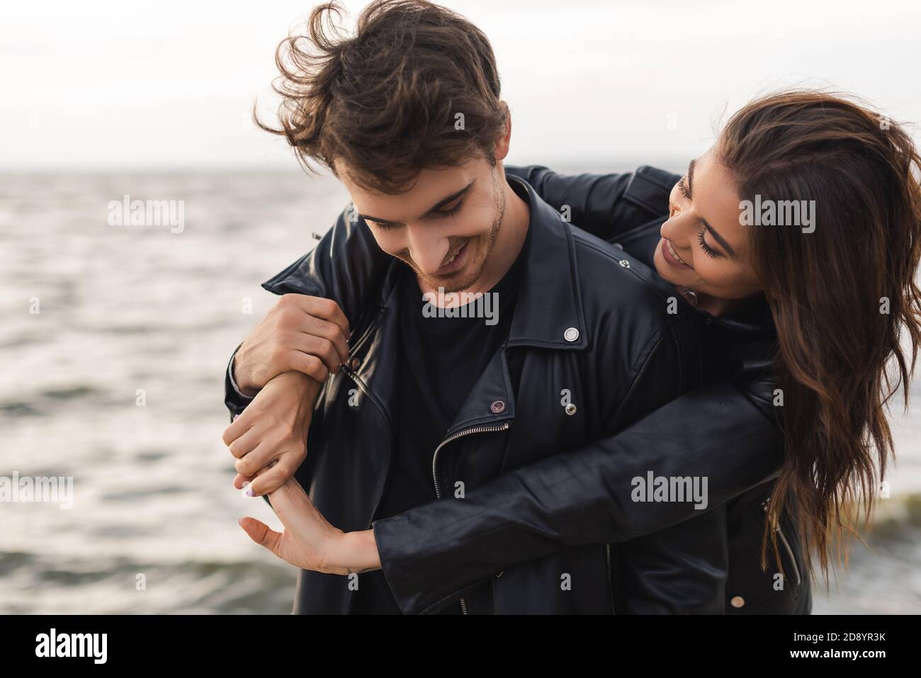 Beautiful brunette in leather jacket hi-res stock photography and ...
