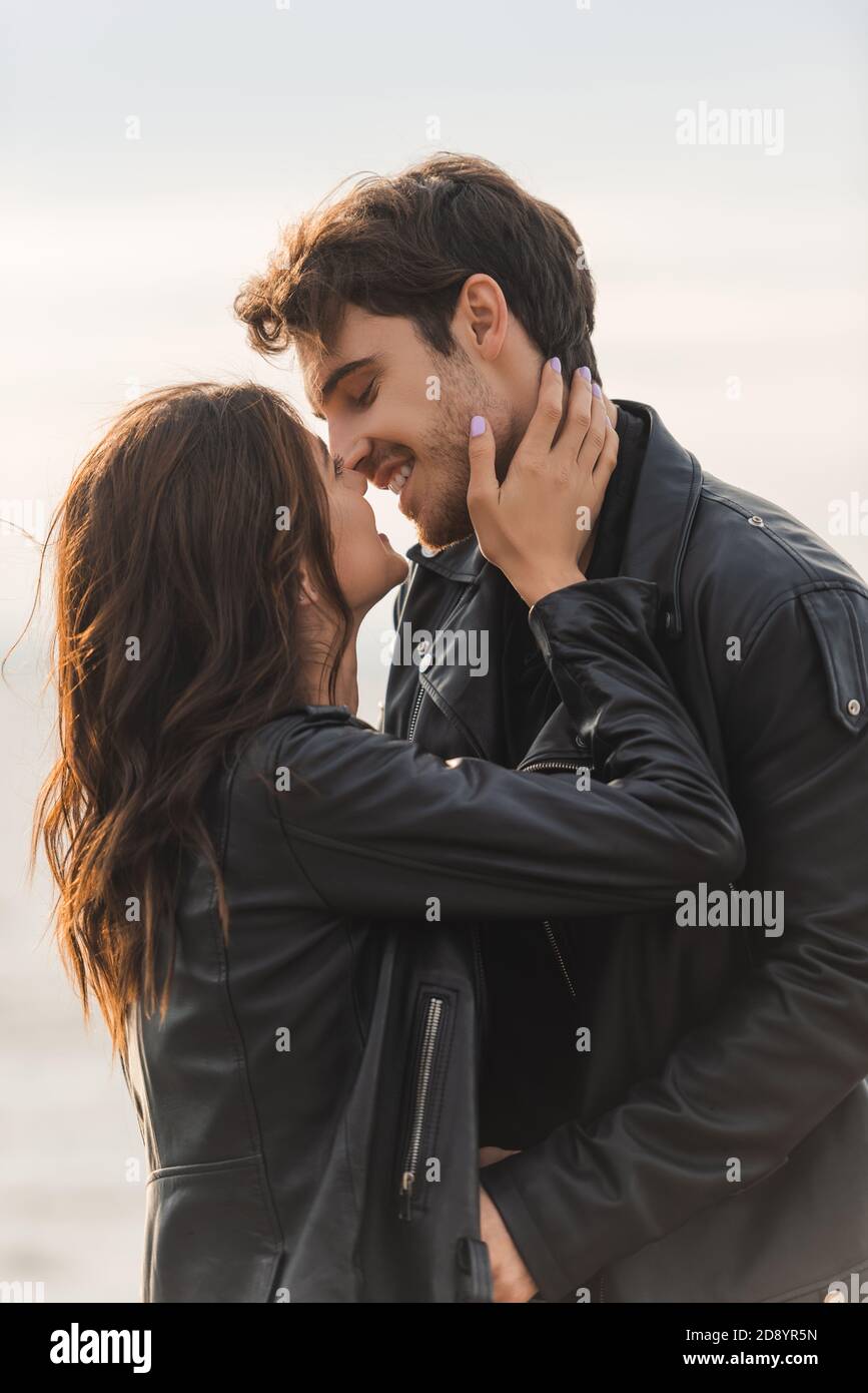 Beautiful brunette in leather jacket hi-res stock photography and ...