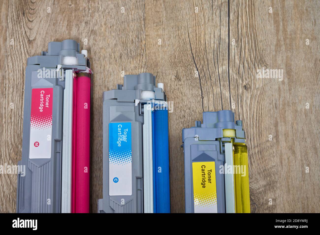 Toner cartridges for color laser printer. Magenta, cyan and yellow Stock Photo