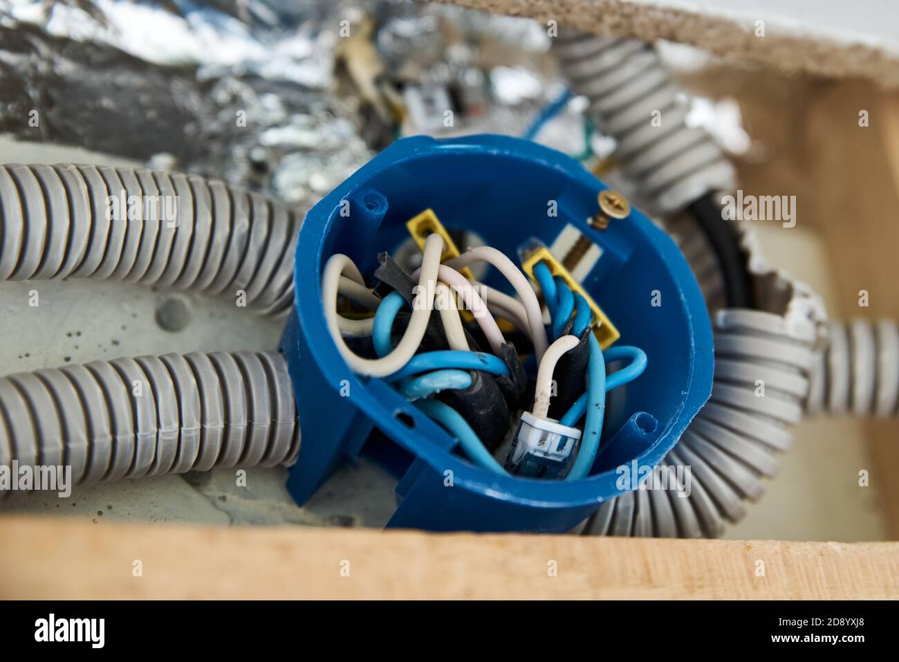 Socket for wiring in concrete wall. Renovation concept Stock Photo - Alamy