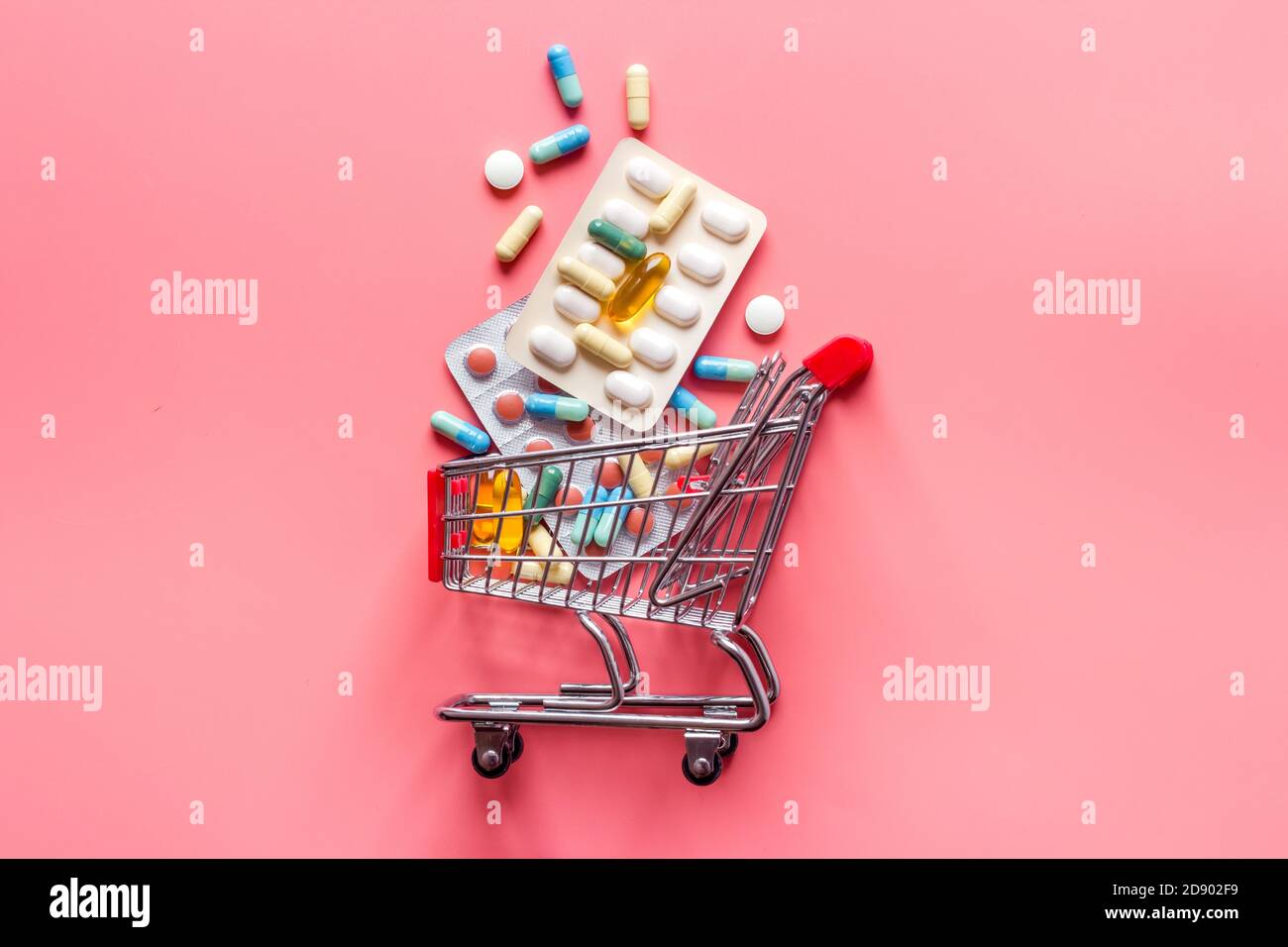 Online pharmacy shopping concept. Basket with pills and medicine Stock