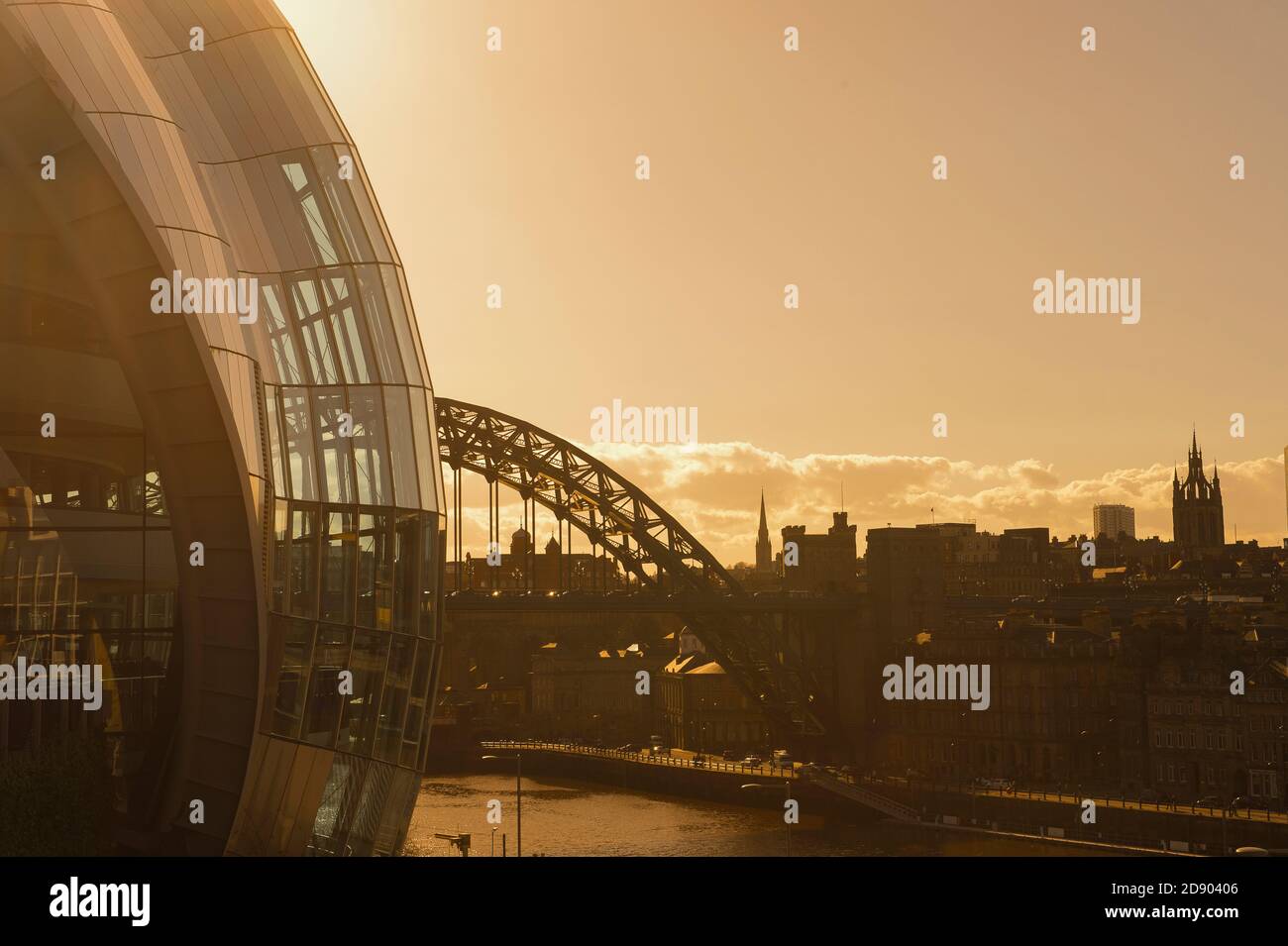 View of the Sage Gateshead, concert venue and the Tyne Bridge crossing from Gateshead to Newcastle upon Tyne, in North East England. Stock Photo