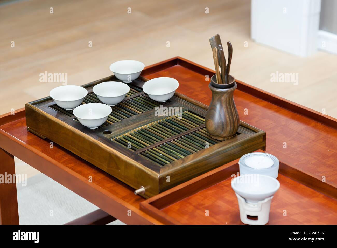 Tea set on the table in a modern Chinese tradition tea room. Stock Photo