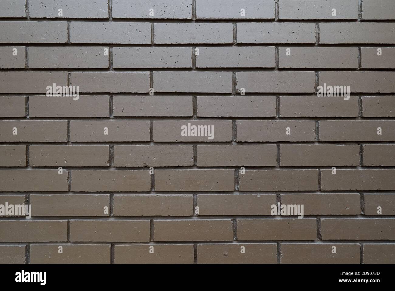 Brown brick wall full frame as background and texture Stock Photo