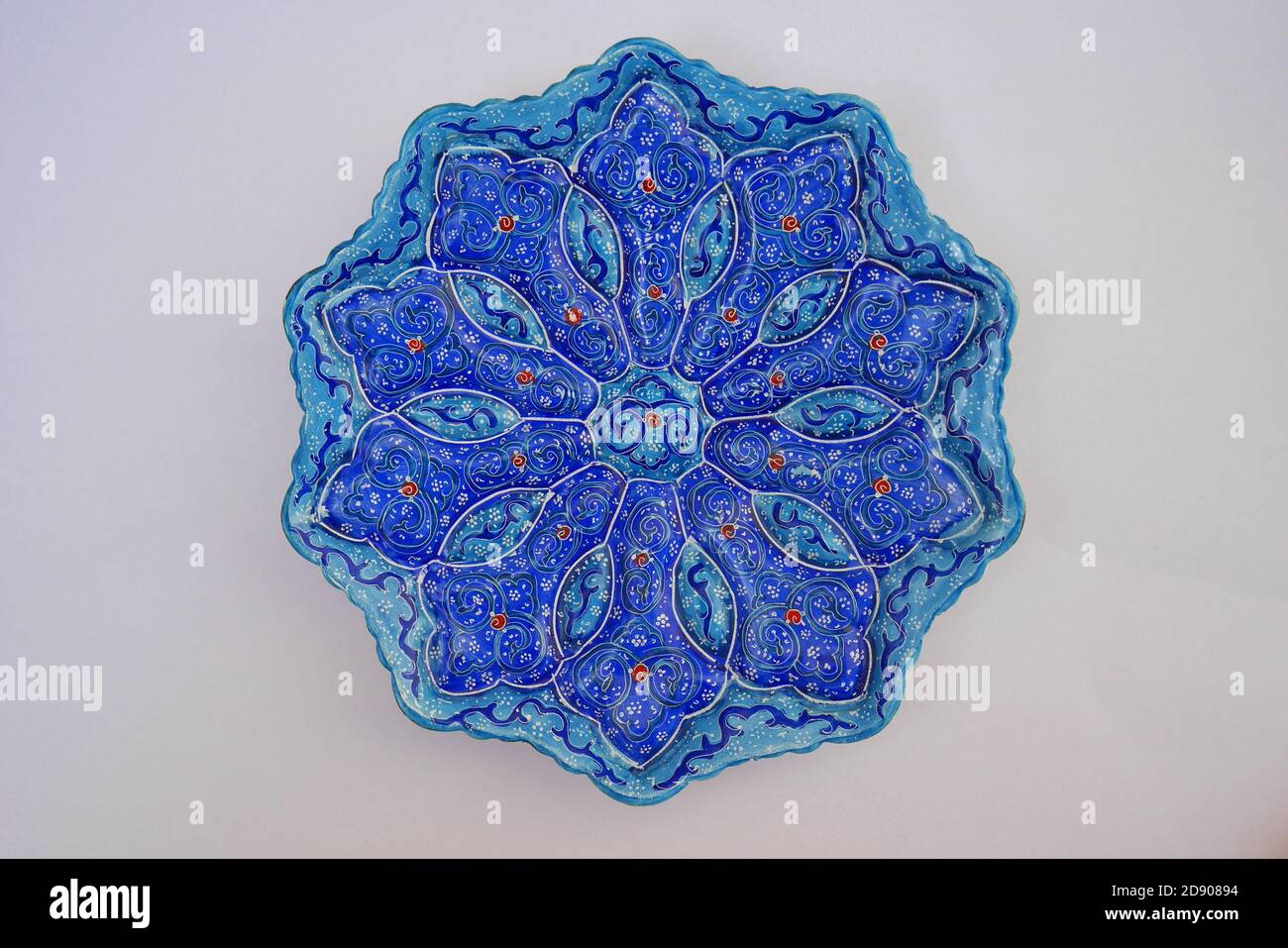 Enameled blue turquoise metal plate from Iran, Persia Stock Photo