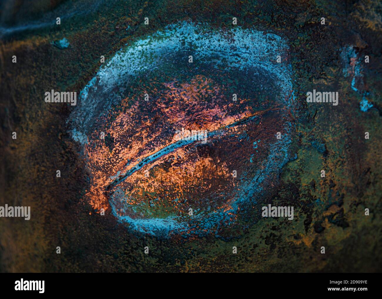 Multicolored rusty metal background. Iron background covered with rust and multicolored paint Stock Photo