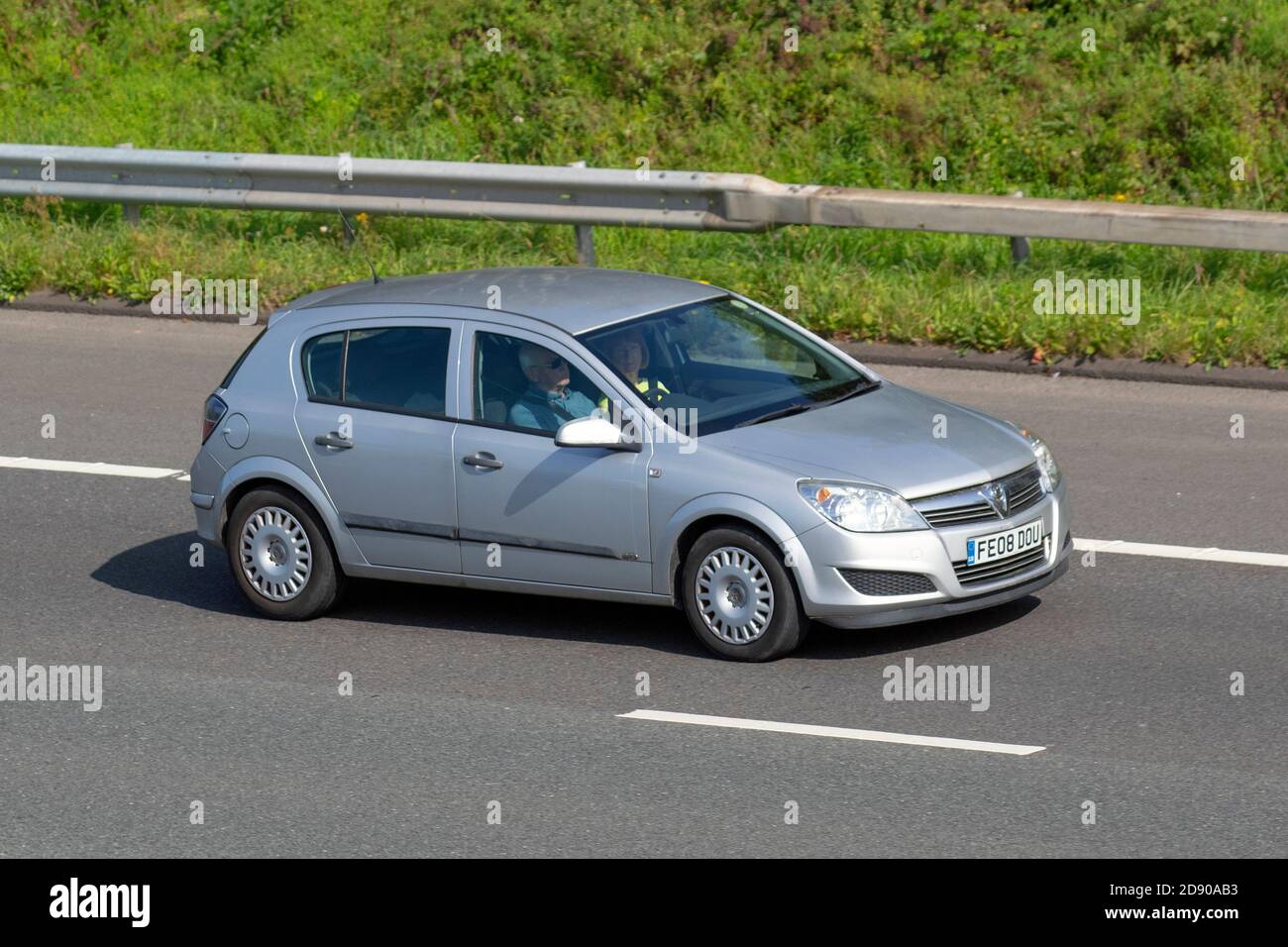 2008 08 silver Vauxhall Astra Life A/C A; Vehicular traffic, moving vehicles, cars, vehicle driving on UK roads, motors, motoring on the M6 motorway highway UK road network. Stock Photo