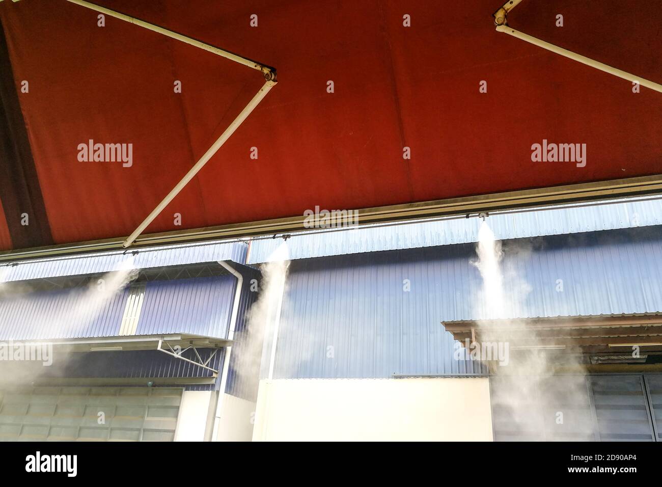 Water mist cooling system lowers ambient temperature at restaurant Stock Photo Alamy