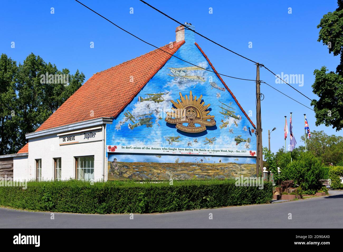 Regimental emblem of the Australian Commonwealth Military Forces on the facade of the Dreve restaurant/cafe in Polygon Wood near Zonnebeke, Belgium Stock Photo