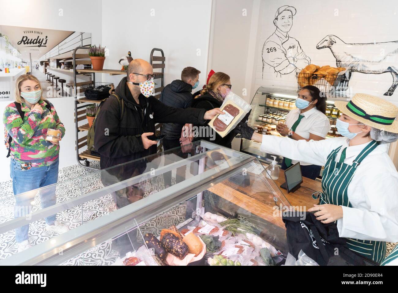 Rudys Vegan Butcher delicatessen opens in Islington London with a sell out day.  Queues formed for an hour before until all the products sold out. Stock Photo