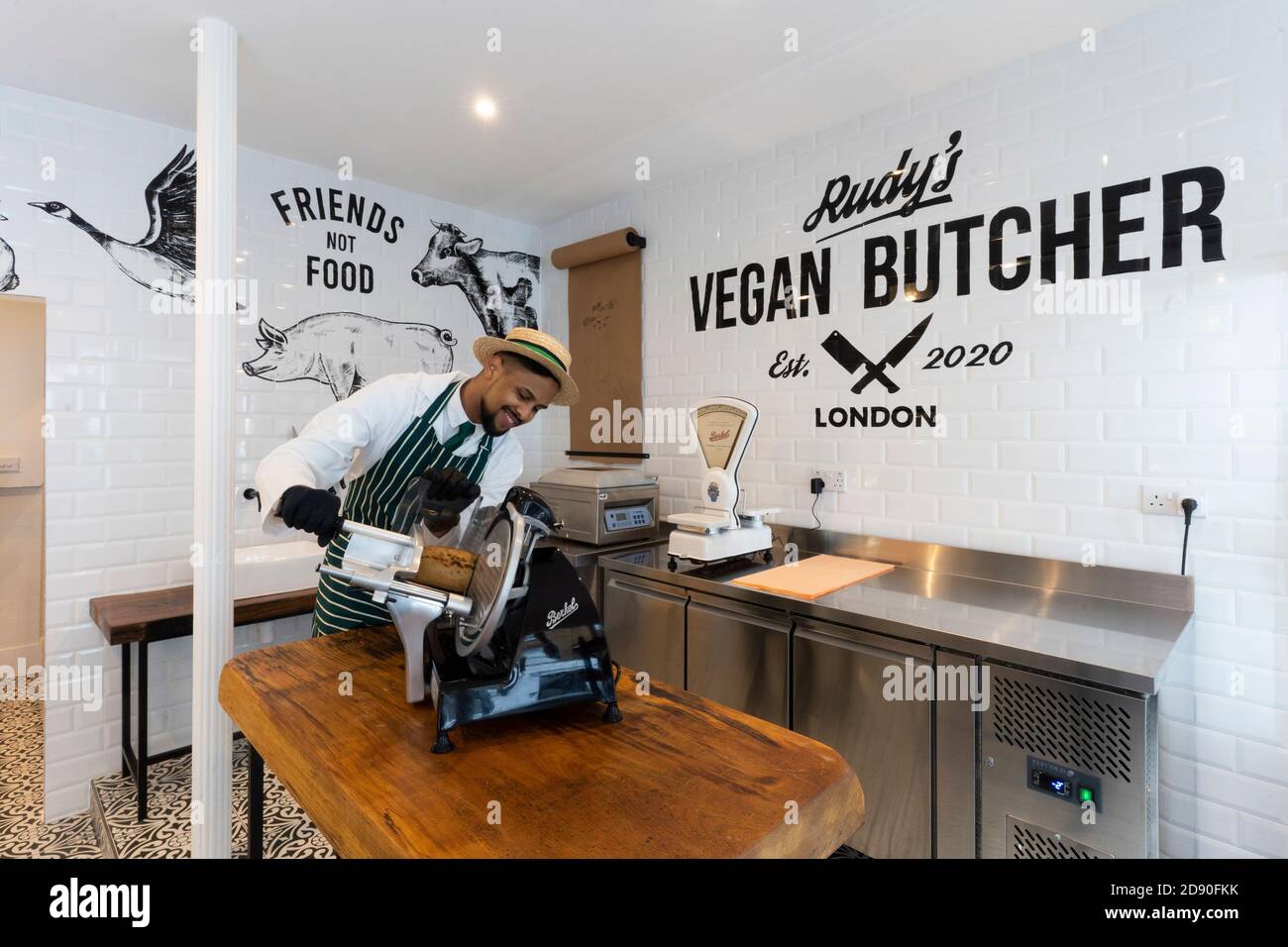 Rudys Vegan Butcher delicatessen opens in Islington London.  Picture shows 'butcher' slices meat substitute. Stock Photo