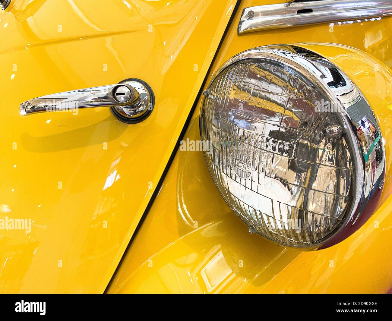 the headlamp and handle for unique car where made in Germany. Stock Photo