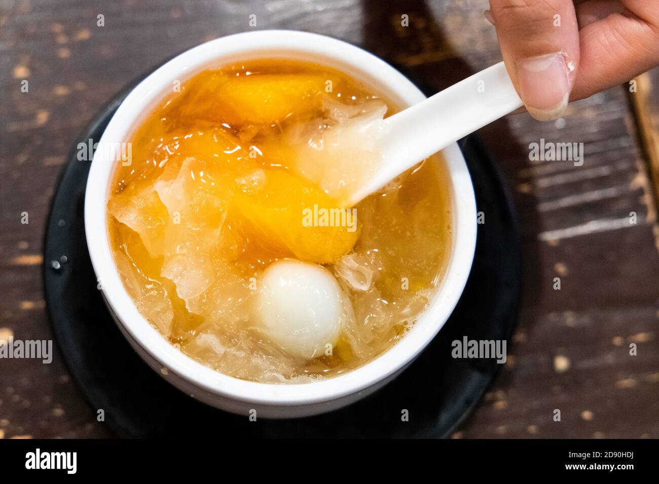 Papaya with snow fungus and egg sweet dessert soup Stock Photo Alamy