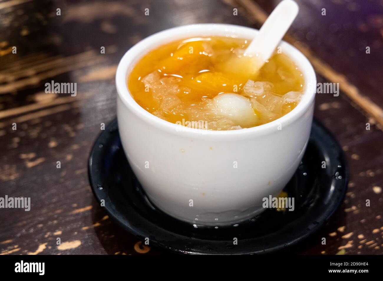 Papaya with snow fungus and egg sweet dessert soup Stock Photo Alamy