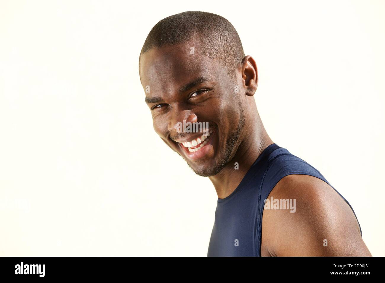 Close up side portrait of handsome young african american man smiling ...