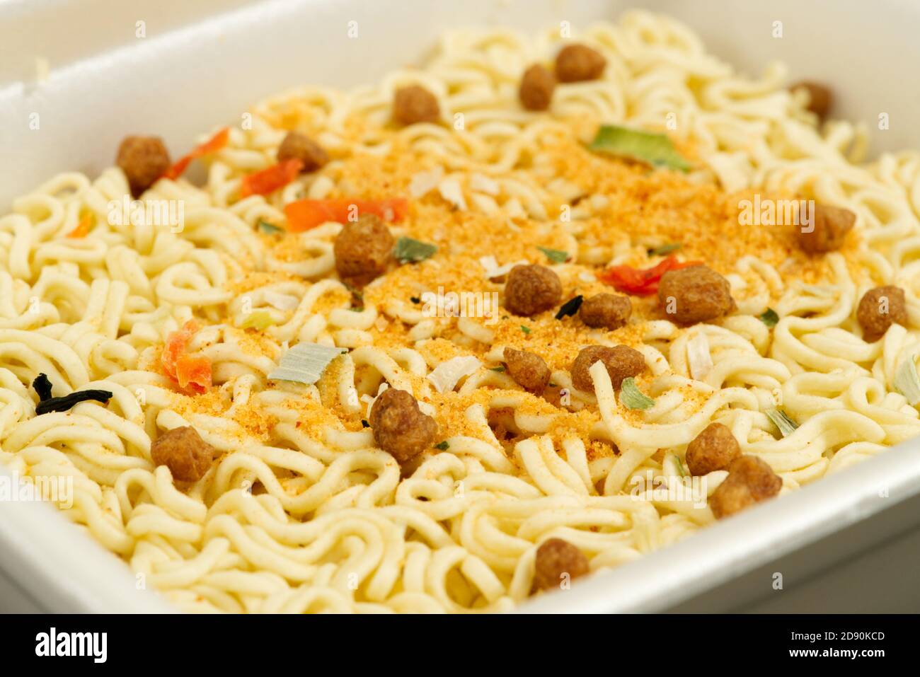 instant noodles with spicy close up, angled macro shot Stock Photo Alamy