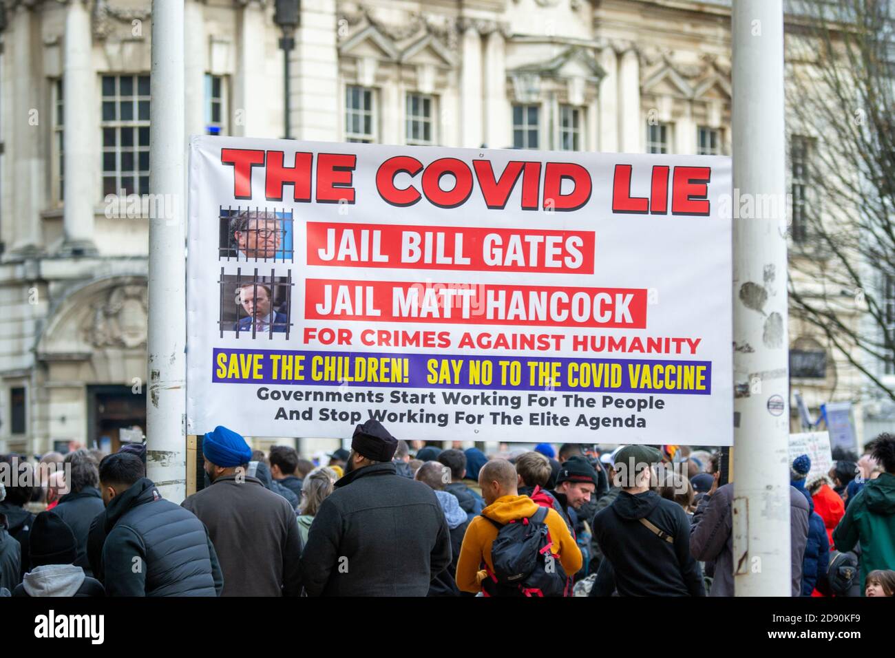 'The Covid Lie' sign at Freedom Rally in Birmingham on 31st October, as Boris Johnson announces a month long national lockdown Stock Photo