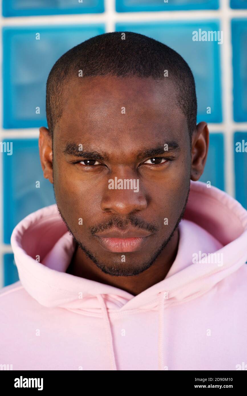 Close up portrait of tough african american male fashion model staring Stock Photo