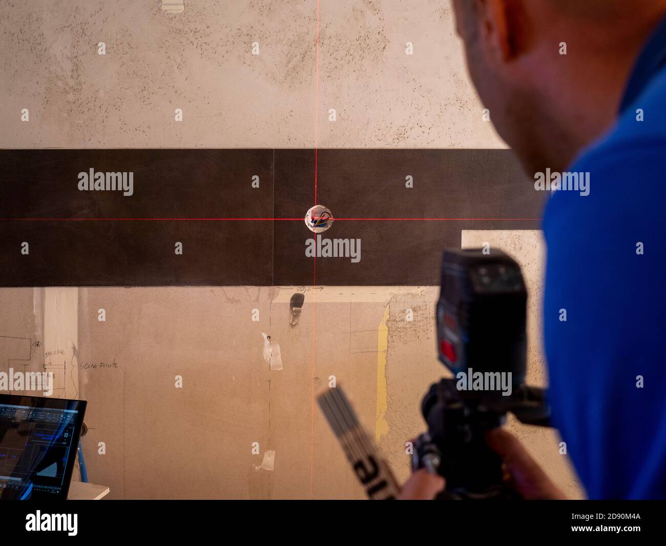 laser level on the wall Stock Photo - Alamy