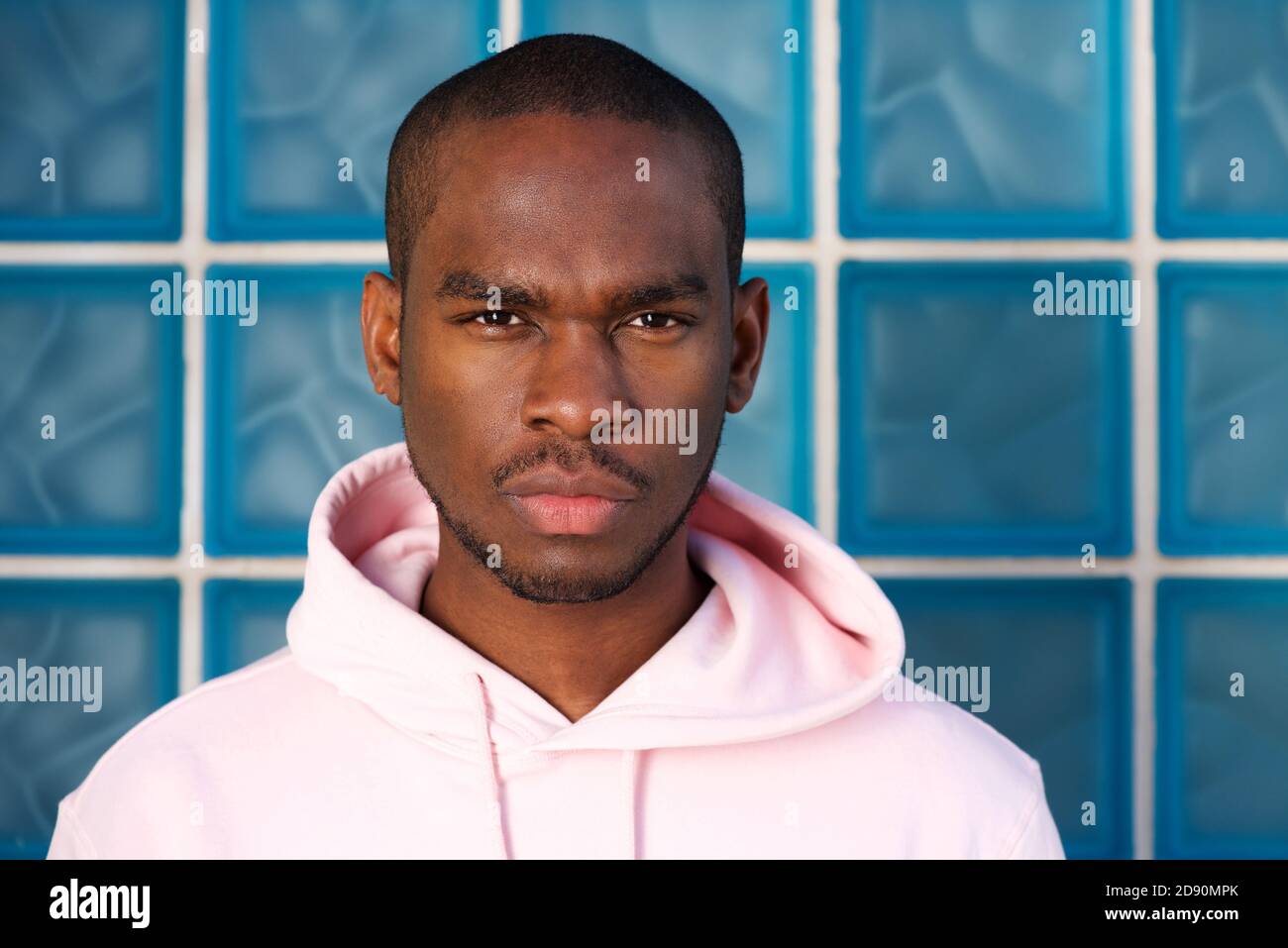 Close up portrait of cool young black man staring Stock Photo - Alamy