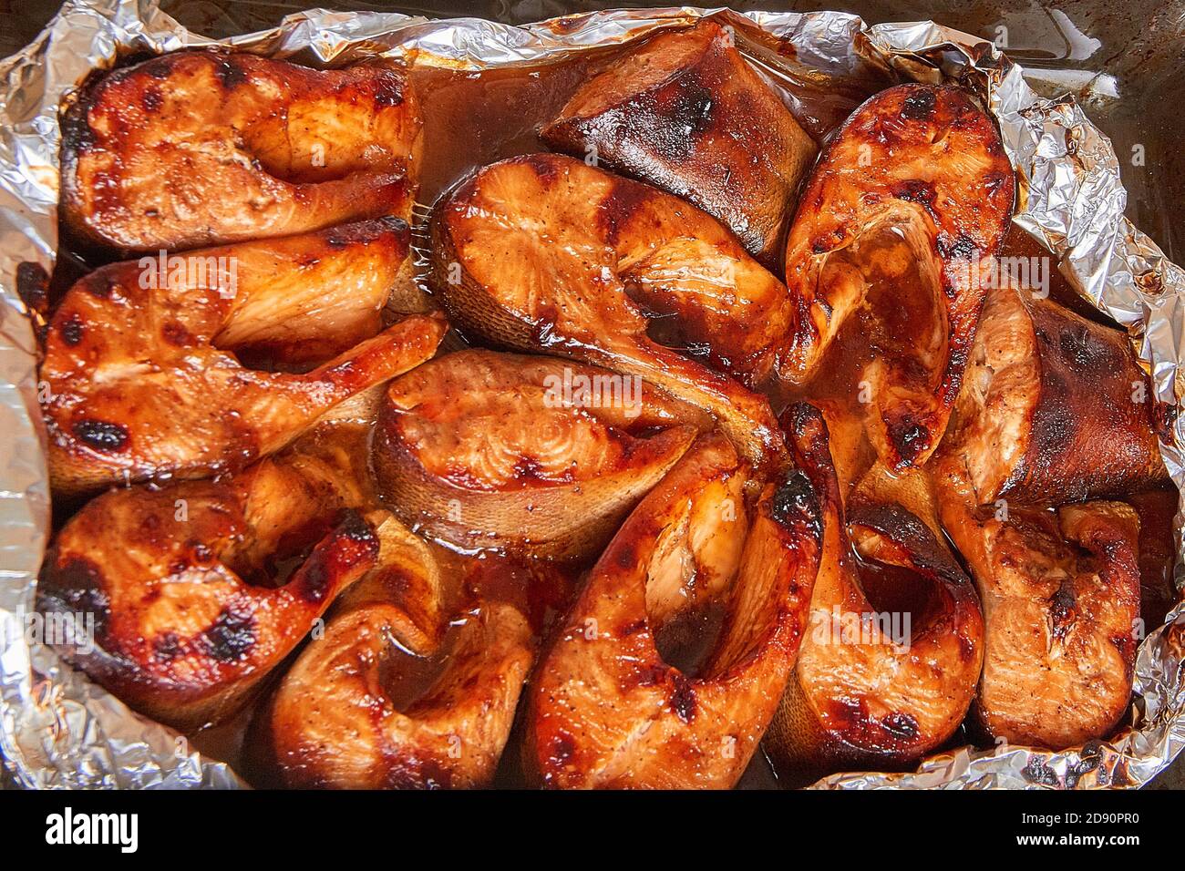 baked red fish in a marinade of teriyaki sauce Stock Photo