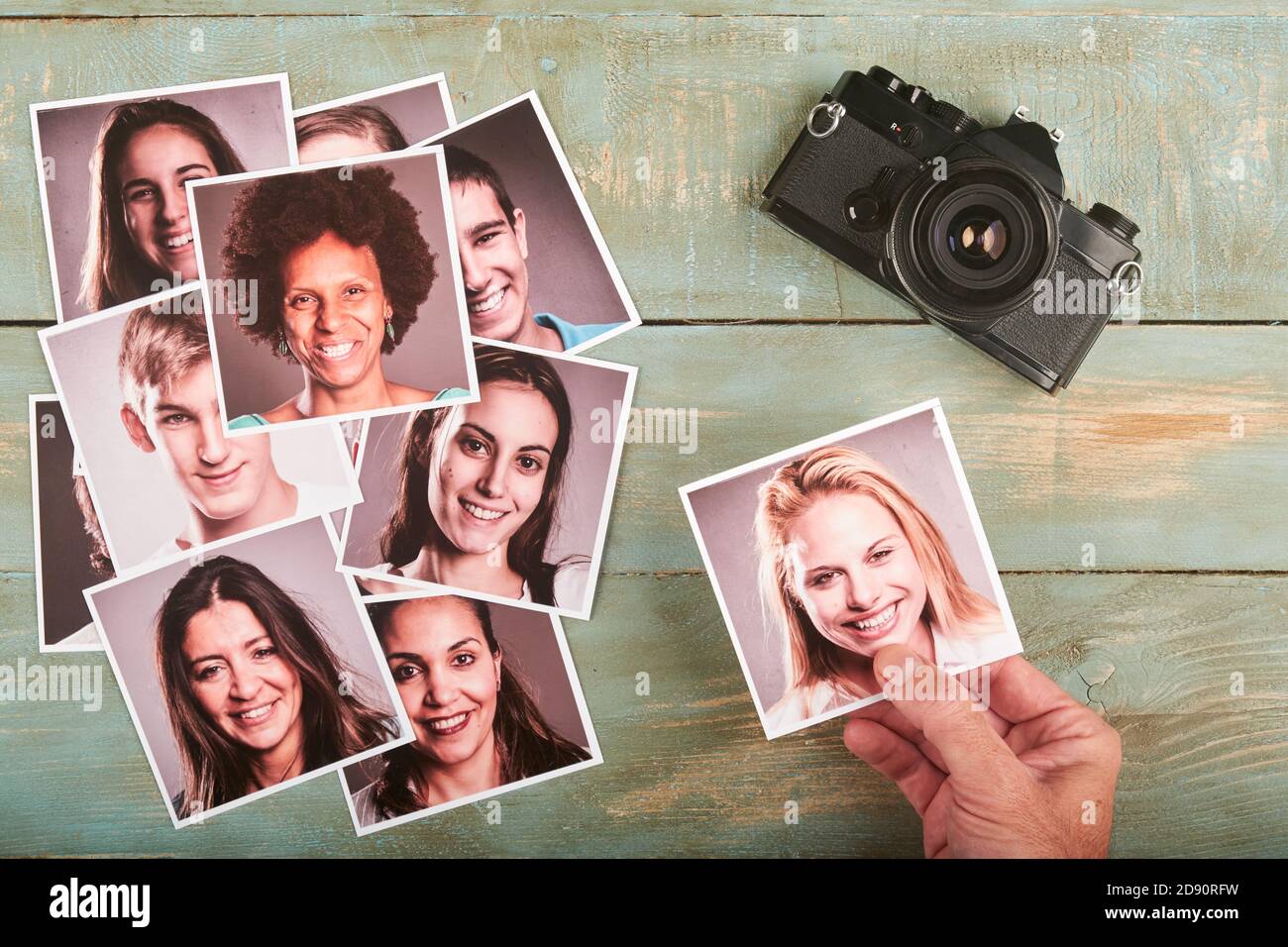 photographer choosing photos of models on a desktop Stock Photo - Alamy
