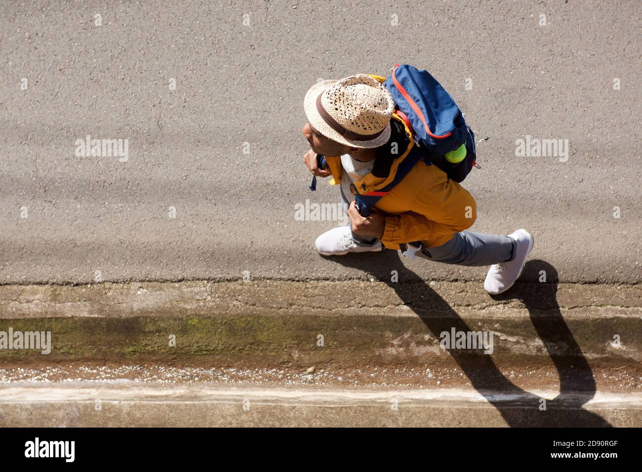 Black male traveler backpack walking hi-res stock photography and ...