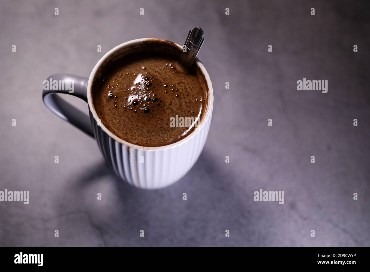 Steamed fresh black coffee cup on a dark table. Morning espresso Stock Photo Alamy