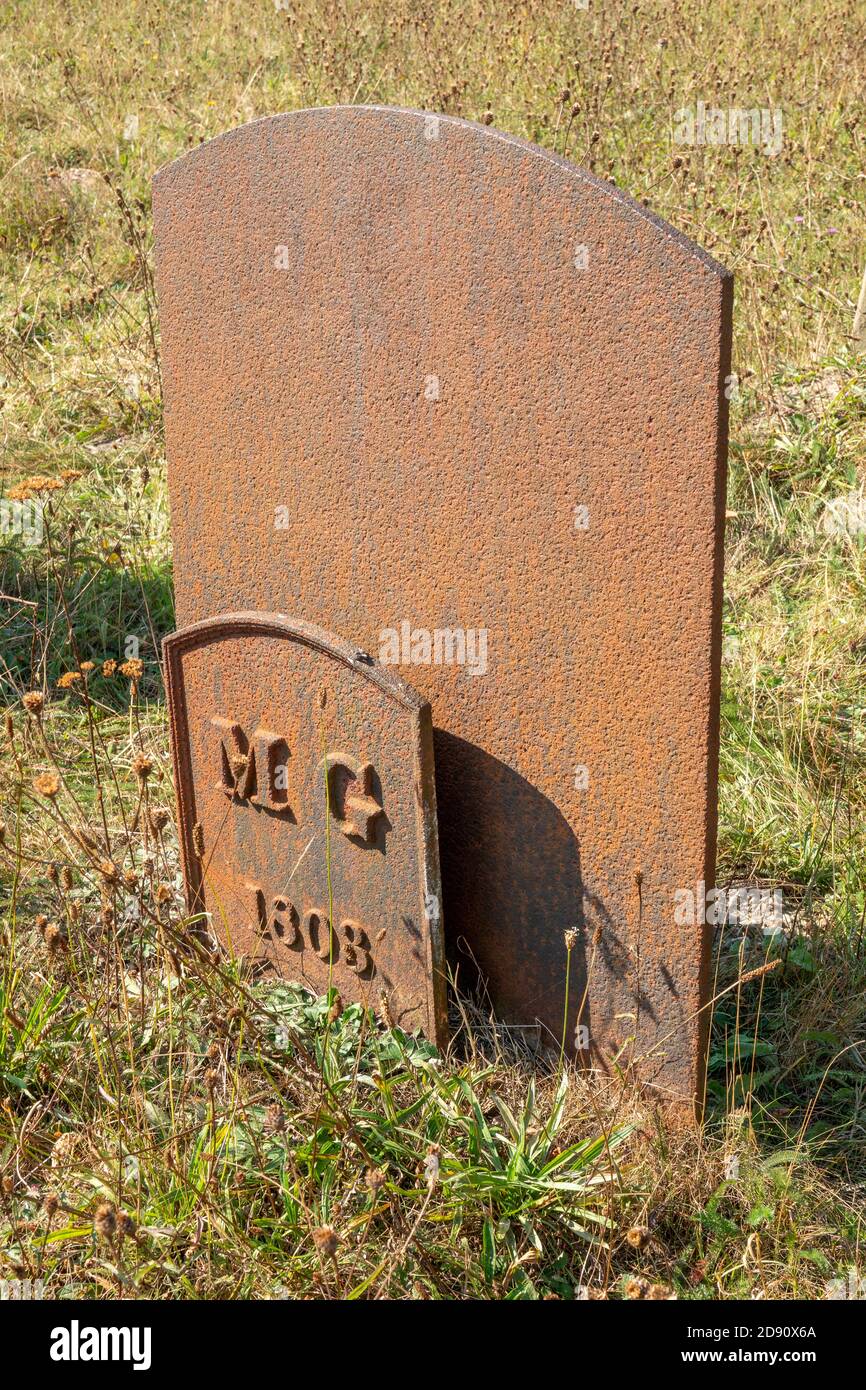 Cast iron 'headstones' grave markers at St Peter's Church, Westleton, Suffolk,UK Stock Photo