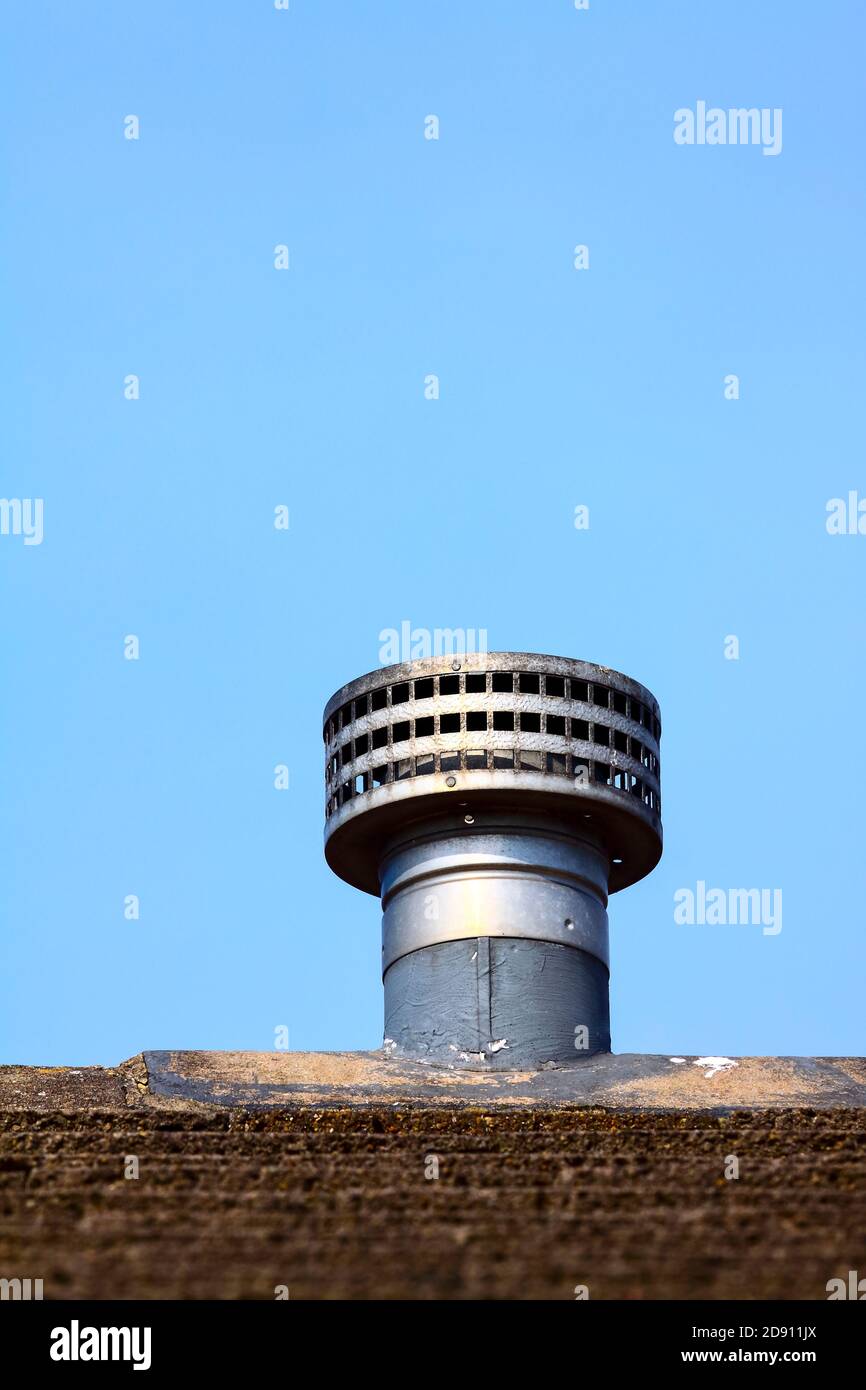 Gas fire metal galvanized flue fitted as a replacement ridge tile to