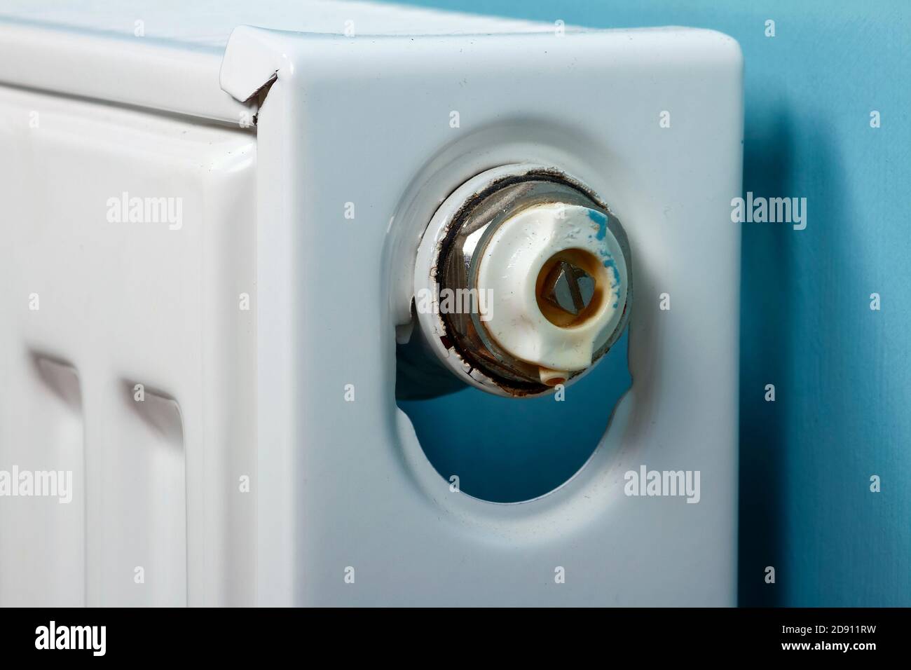 Close up of a central heating radiator and bleed valve Stock Photo Alamy