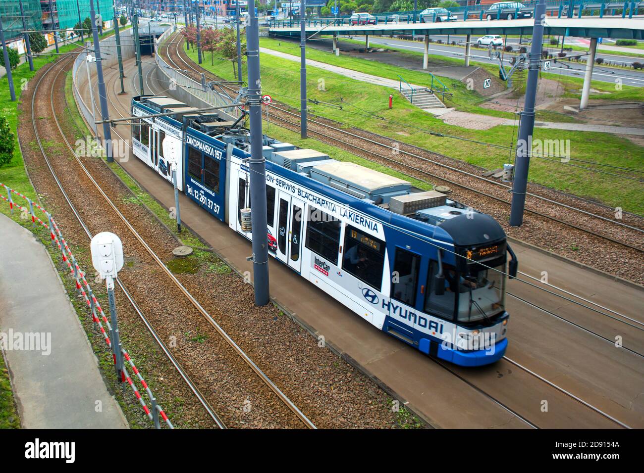 Trams In Europe Modern urban transport of European cities. Low floor tram Stock Photo ...