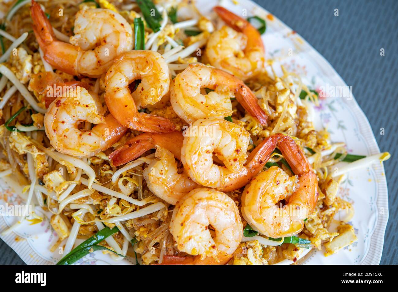 Fried noodle Thai style with prawns Stock Photo