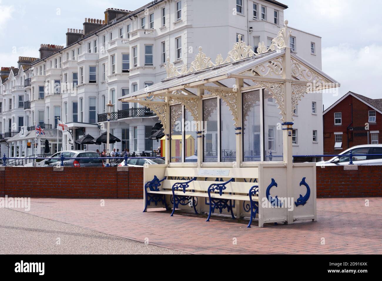 EASTBOURNE, UK - AUGUST 28, 2019: Ornate sheltered bench on Royal Parade in the seaside town of Eastbourne, England on August 28, 2019 Stock Photo